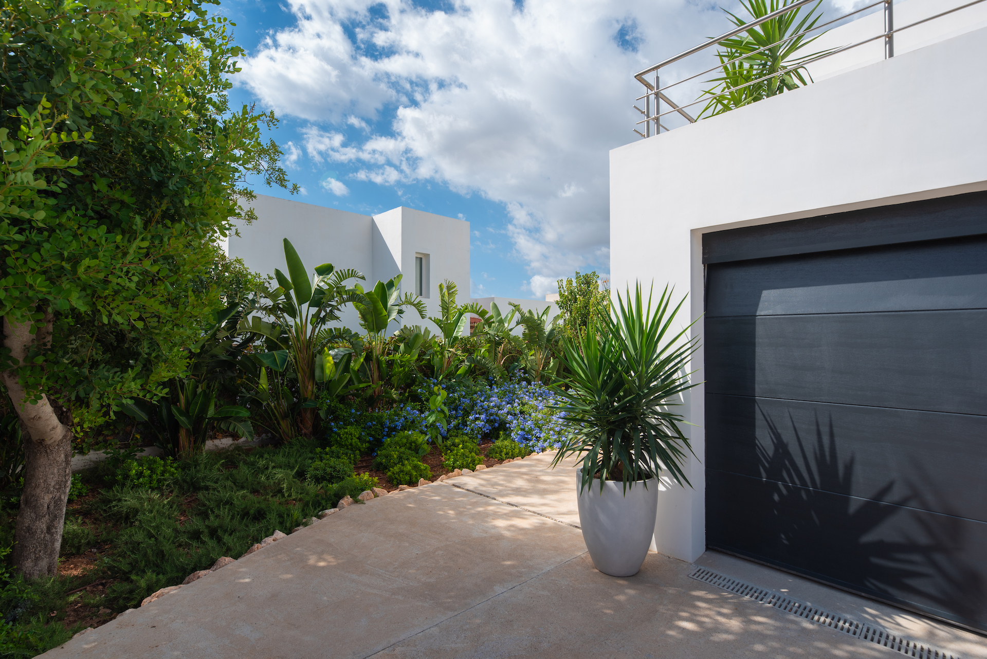 Resa estates Ibiza villa for sale tourist license modern side garden .jpg